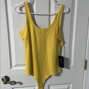 Yellow bodysuit from Fashion Nova